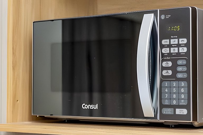 Studio com sofá + AC / em frente FGV e Sírio